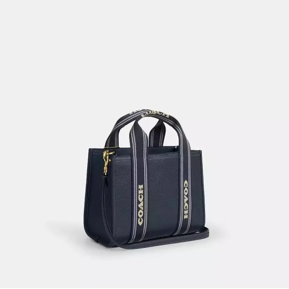 Coach Leather Smith Tote 24 with Striped Handles.